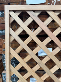 Hardwood lattice panel installation, garden trellis