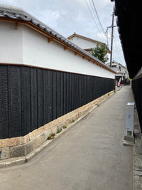 Yakisugi Sumi cladding installed on a traditional Japanese building exterior